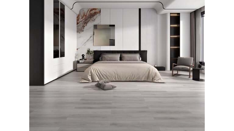 Modernes Schlafzimmer mit hellem Laminatboden in Holzoptik.